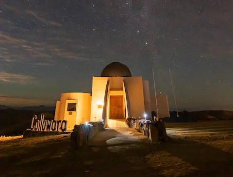 Entrance of the Collowara Observatory with the galaxy above it.